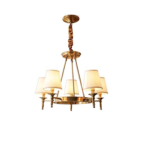 Lampe en laiton moderne pour illuminer une salle à manger chaleureuse