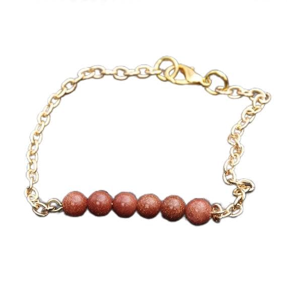 Bracelet goldstone 6mm pierres naturelles rondes polies bijou ajustable