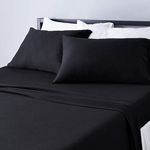 Image of Amazon Basics 4 Piece Breathable Cotton Jersey Bed Sheet Set, Stretchy Flat and Fitted Sheets with Pillowcase, Queen, Black, Solid