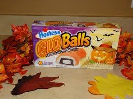 HOSTESS GLO BALLS (GLO BALLS)- COCONUT & MARSHMALLOW COVERED CHOCOLATE CAKE WITH CREAMY FILLING