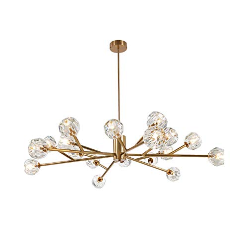 Lustres de branche en cristal pour illuminer chaleureusement une chambre dorée
