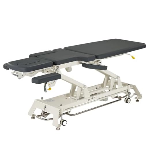 Camilla eléctrica para fisioterapia, osteopatía y quinesiterapia – Altura regulable con mando de barra lateral de acero – con 1 gota adicional (cervical y torácico)