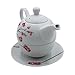 Tetera de porcelana, juego de té para uno Imagen de Tetera de porcelana, juego de té para uno