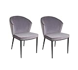 La chaise Lucy se caractérise par son large dossier enveloppant pour une allure chic et classique. Son piétement en métal noir vient moderniser l'ensemble.