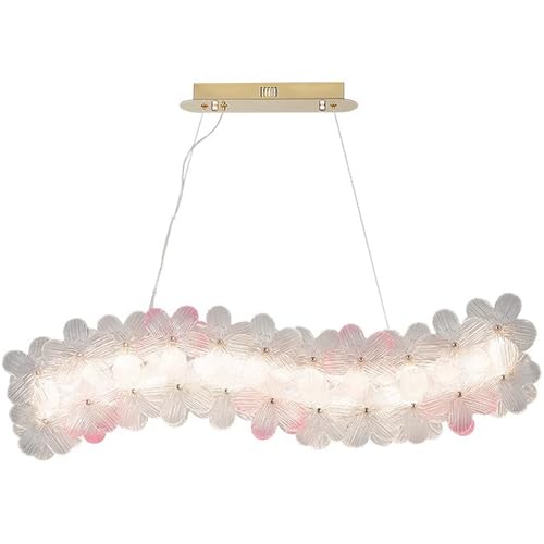 Lampe à lustre rectangulaire contre les zones d'ombre sur la table de salle à manger