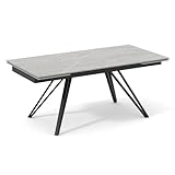 Son plateau en céramique pleine masse de 11mm gris marbré mat passe de 160 à 240 cm.