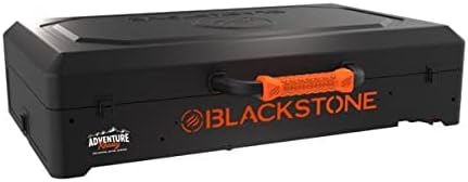 The Blackstone cart folded into a compact, briefcase-like form, side view with handle.