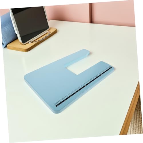 Table de matelassage pour machine à coudre évitant la chute des tissus - 7