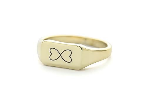 Bague chevalière en or infini : l'élégance d'un bijou ciselé de haute qualité pour femme