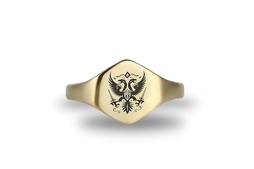 Bague symbole ancien avec aigle héraldique gravé sur chevalière hexagonale