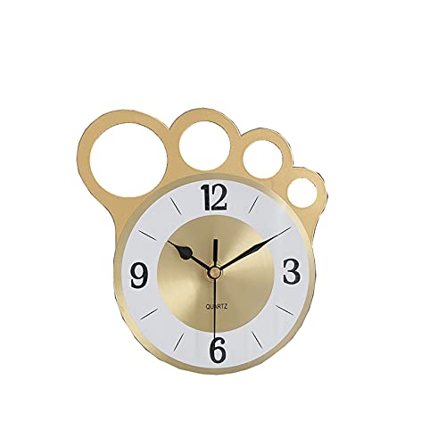 Reloj de mesa de hierro nórdico con acabado dorado y exclusivas líneas de diseño