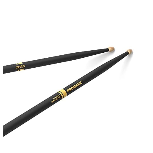 ProMark Baquetas Bateria - Rebound 5B - ActiveGrip - Se vuelve más pegajoso a medida que las manos sudan - Acabado de agarre activo, Punta de Bellota, Madera de nogal americano - 1 par