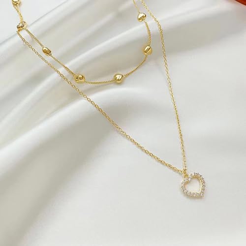 Collier double couche cœur en or, le pendentif de mariage idéal à offrir