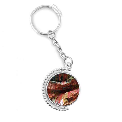 Llavero giratorio antiestrés con patrón de piedra multicolor para llevar tus llaves