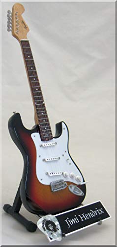 JIMI HENDRIX Guitare Miniature avec médiator Fender Sunburst - Les Beatles, Paul McCartney, John Lennon, RIngo Starr, George Harrison JIMI HENDRIX Guitare Miniature avec médiator Fender Sunburst