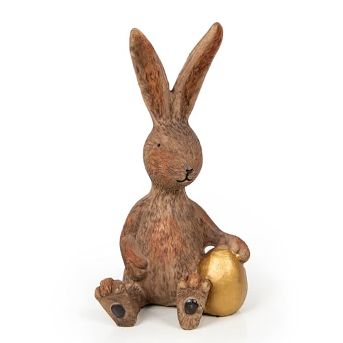 Dekofigur Osterhase Sitzend: Hasen-Deko Ostern & Frühling, Osterdeko Figur, Dekohase mit Osterei, Osterdekoration Tisch & Fensterbank, Osterhasen Frühlingsdeko, Dekohase Braun & Gold, 17 x 9 x 8 cm