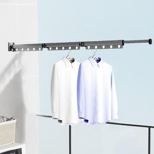 Étendoir à linge mural pliable pour optimiser l'espace dans une petite buanderie
