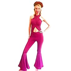 selena in purple jumpsuit