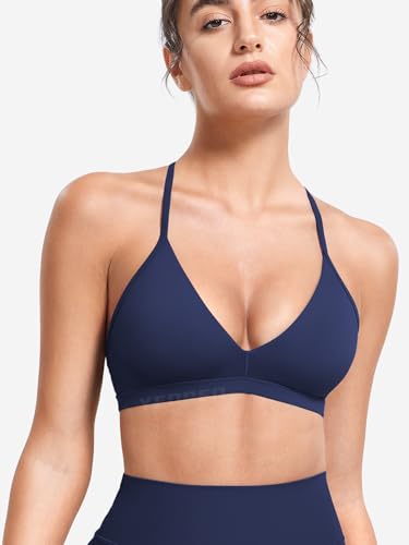 Image of YEOREO CoreFlex Sports Bras for Women Strappy Padded Halter Open Back Light Impact Deep V Neck Yoga Workout Gym Tops
