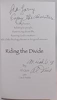 Riding the divide: Riding horses, relating to people, reminiscing about life, revering God's creation--with a little theology thrown in for good measure 0974388602 Book Cover