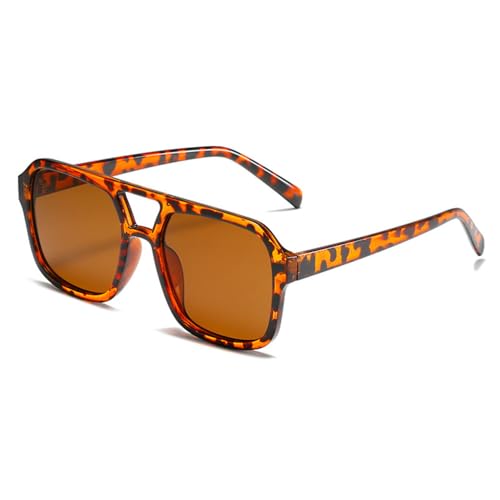 Lunettes de soleil classiques grandes et rétro pour femme adepte de conduite