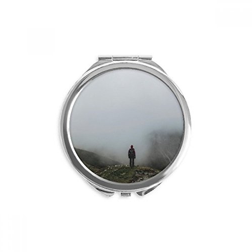 Miroir de poche à la main portable motif nuages nature