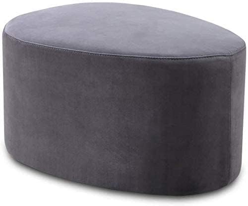 Tabouret bas idéal pour changer de chaussures dans une entrée moderne