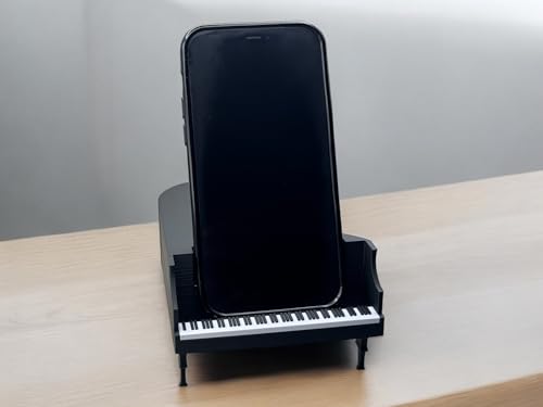 Support de téléphone pour bébé à queue de piano PianoPerch™ sur votre bureau ou studio