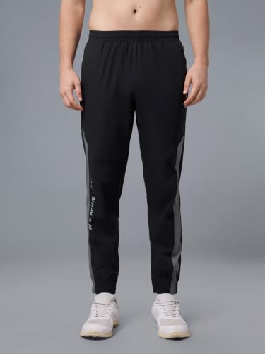 Image of TECHNOSPORT Men's Regular Fit Joggers with Zip Pockets, TECHNOLITE Quick Dry Stretchable Lightweight Track Pants for Gym Running and Casual Wear