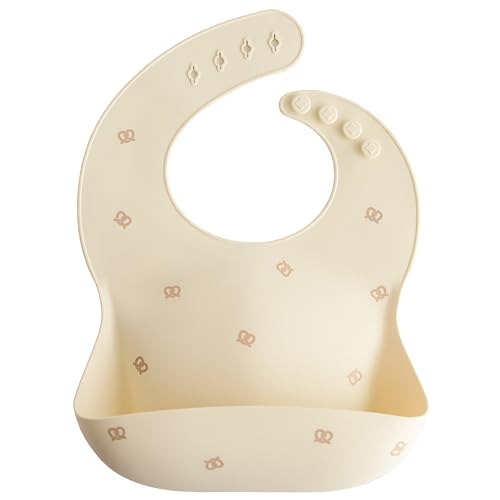 Image of mushie Silicone Baby Bib | Adjustable Fit Waterproof Bibs (Pretzel)