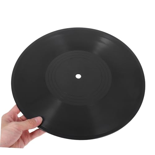 Decoración de pared con discos de vinilo vintage para dar un aire retro a tu sala o fiesta 5