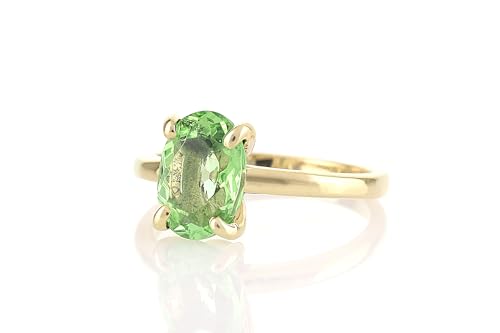 Tourmaline verte bague solitaire unique qui capture l'emotion d'un bijou eternel