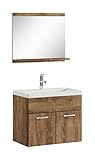 Un set di mobili da bagno moderno, con lavandino e specchio.