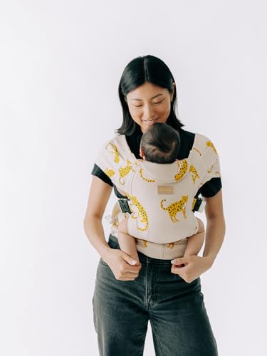 Image of Tushbaby Pearl Wrap Baby Carrier for Newborns 8–20 lbs, Hands-Free Ergonomic Infant Carrier with Storage, Bottle & Wipe Holder, Adjustable Soft Fabric, Leopards