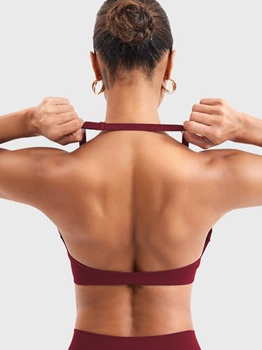 Image of YEOREO Halter Sports Bras for Women Low Impact Removable Padded Adjustable Deep V Bra Seamless Workout Gym Crop Tops