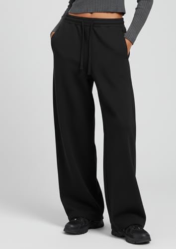 Image of Aesthetic Gothic Wide Leg Pants for Men | Tribal Print Baggy Streetwear | Oversized Track Pants with Elastic Waist | Black and White Relaxed Fit Bottoms