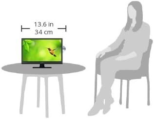 Size comparison of the 13.6-inch TV next to a person