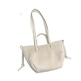 Questa borsa in pelle unisce praticità e stile personale, diventando un tocco finale di stile per le uscite quotidiane