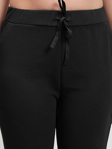 Image of Tokyo Talkies Women's Co-ord Set | Sleeveless Crop Top & Drawstring Trousers | Perfect for Casual Outings & Vacations