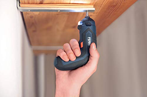 User operating the Ferm CDM1150 screwdriver with the cutting attachment on fabric.