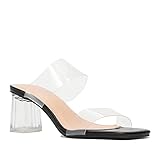 Zapatillas con tiras transparentes. Modelo de punta abierta cuadrada. Con tacón en bloque transparente. Textura, suela interior y exterior: sintético. Altura del tacón: 6 cm.