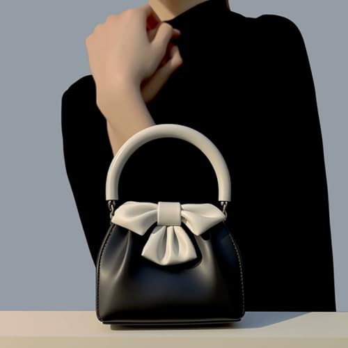 Sac à main noir avec nœud papillon imperméable pour spectacle