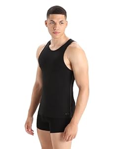Man in a black merino wool tank top