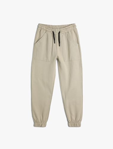 Pantalones de chándal niños de algodón en color beige con bolsillos prácticos 1