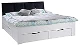 Modernes Doppelbett mit grauem Polsterkopfteil