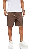 Poches et étiquettes en cuir : pantalon court en lin pour homme avec poches biais double face et une poche arrière plaquée. Les languettes en cuir sur la jambe droite donnent au design uni une touche de qualité