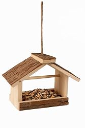 Comedero pájaros Exterior Loo – casita de Madera C...: El comedero pájaros exterior Loo es un modelo pequeño y funcional de madera natural. Con un formato compacto y drenaje incorporado, mantiene el alimento fresco por más tiempo. Una solución sencilla que cumple perfectamente su función. El comedero páj...