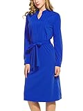 Design: Langarm Blusenkleid mit kleinem Stehkragen, Bindegürtel, Manschetten an den Ärmeln und Plastron mit Biesen im Vorderteil.