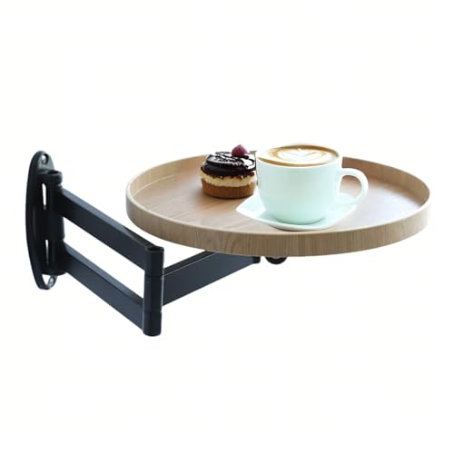 Table murale ronde pliante pour un coin repas de studio optimisé