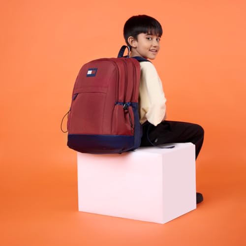 Image of Tommy Hilfiger Professional School Backpack Stud - Burgundy+Navy | Durable Water-Resistant Bag for Teens with Signature Metal Logo | 3 Compartments | Integrated Rain Cover | 30L Capacity